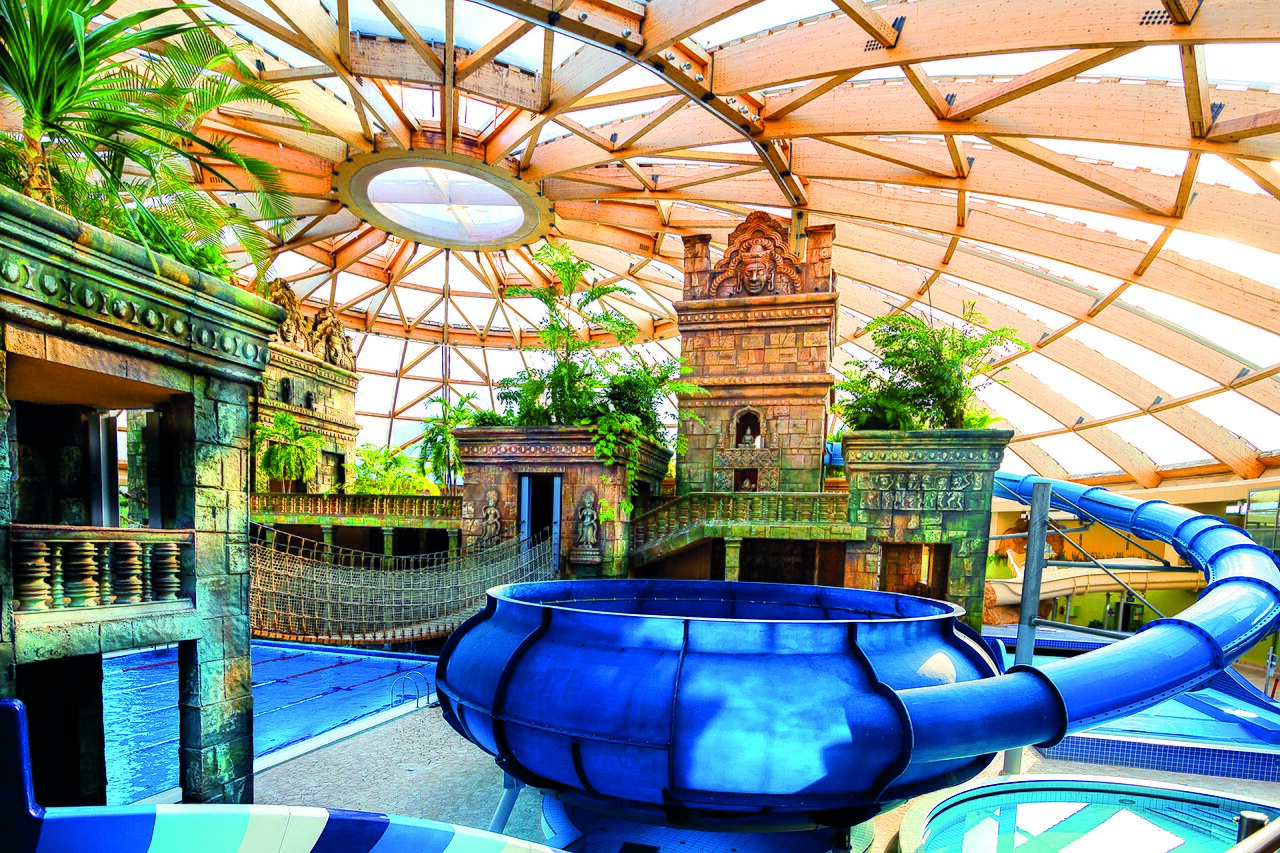 The Onion Slide at Aquaworld Budapest, a wide funnel slide ending in a deep pool