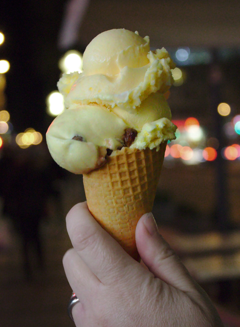 Two scoops of ice cream in a cone