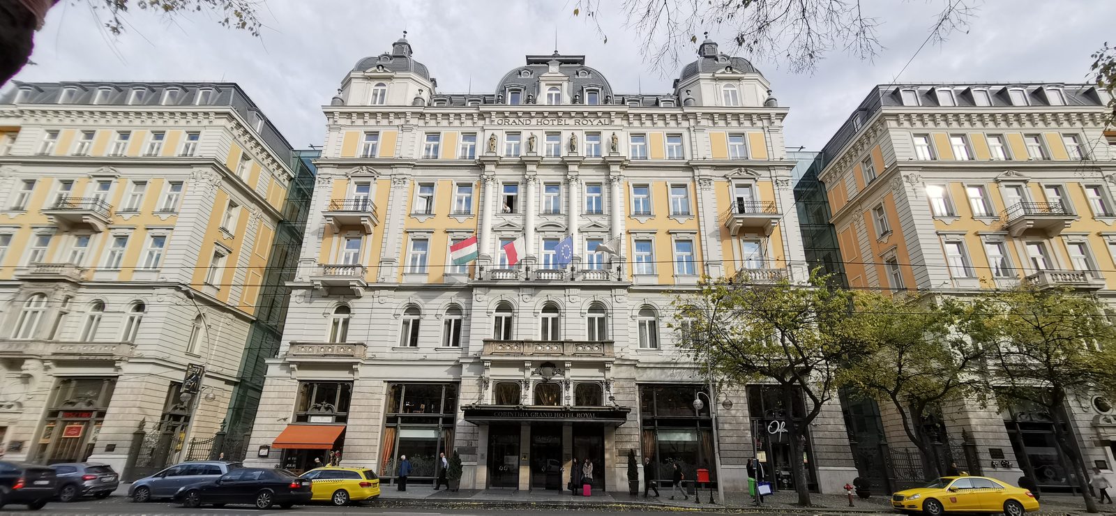 The full facade of the Corinthia Hotel Budapest on Erzsébet körút, with GRAND HOTEL ROYAL lettering on the cornice