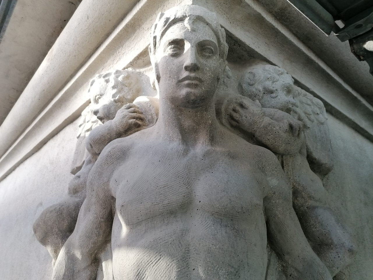 Art Deco relief detail on the Corvin Palace facade in Budapest