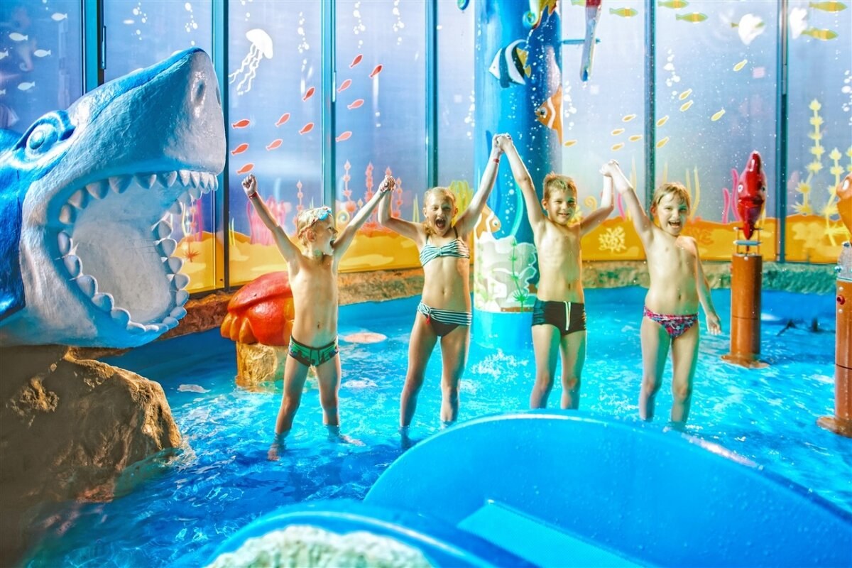 Children in the colourful play pool at Bükfürdő Thermal & Spa.