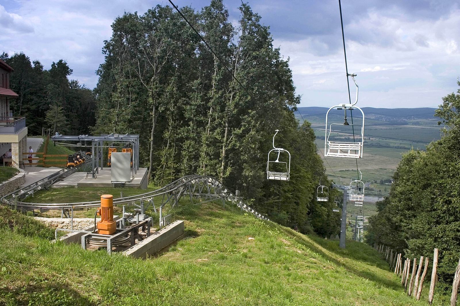 The chairlift and bobsled track of the Zemplén Adventure Park on the wooded hill above Sátoraljaújhely