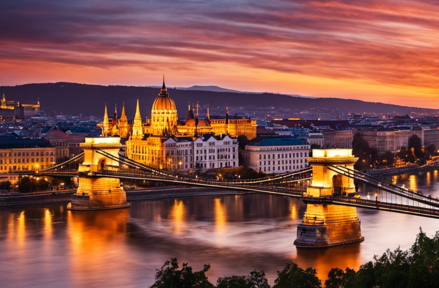 An image showcasing Budapest's iconic Chain Bridge, bathed in warm sunset hues, with the majestic Buda Castle perched atop Gellért Hill in the background